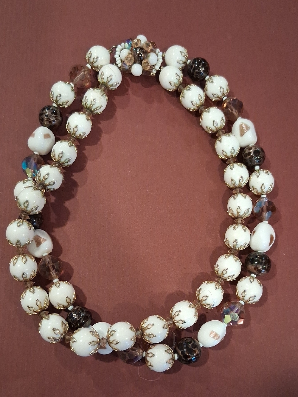 Elegant White Beaded Necklace with Gold Accents